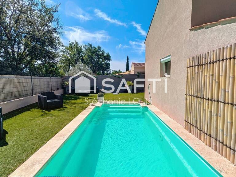 VILLA DE PLAIN PIED AVEC STUDIO ET PISCINE — photo 1