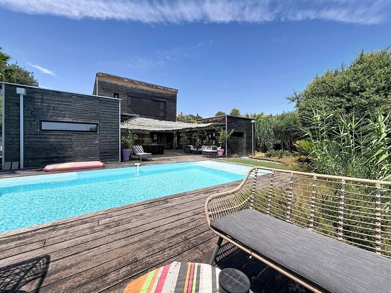 JUVIGNAC : FONTCAUDE – VILLA CONTEMPORAINE EN BOIS AVEC PISCINE ET VUE PANORAMIQUE SUR LE GOLF — photo 1