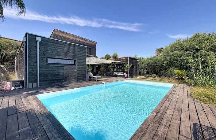 JUVIGNAC : FONTCAUDE – VILLA CONTEMPORAINE EN BOIS AVEC PISCINE ET VUE PANORAMIQUE SUR LE GOLF — photo 2