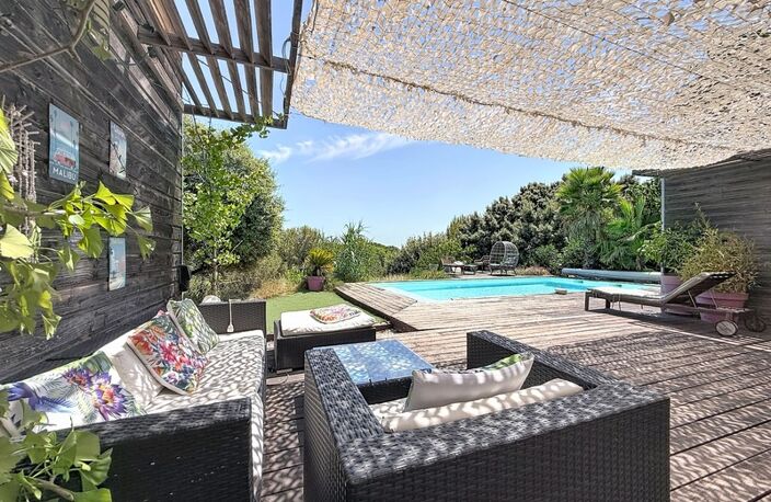JUVIGNAC : FONTCAUDE – VILLA CONTEMPORAINE EN BOIS AVEC PISCINE ET VUE PANORAMIQUE SUR LE GOLF — photo 5