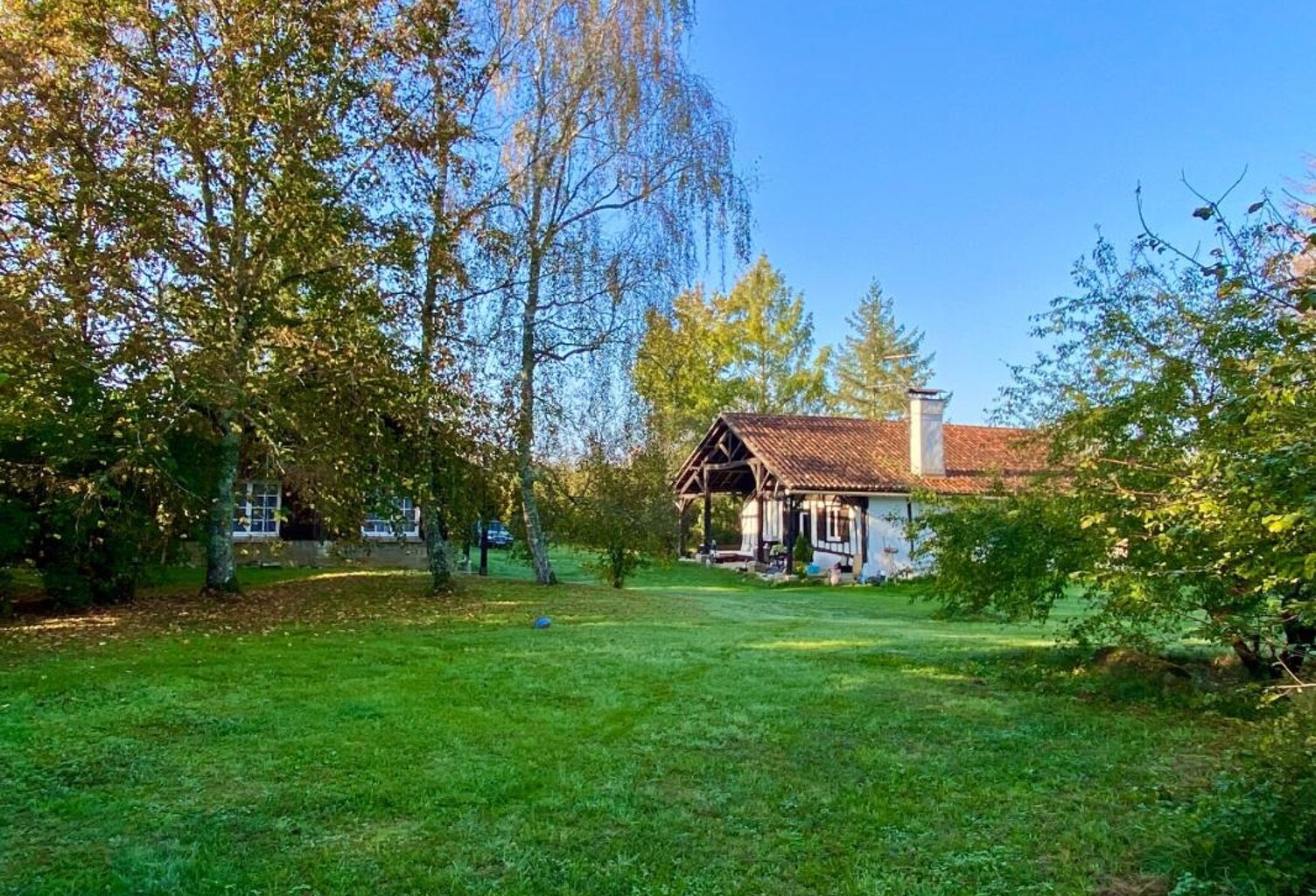 MAISON A COLOMBAGES RENOVEE AVEC GITE INDEPENDANT SUR 2700 M2 DE TERRAIN A LACQUY — photo 1