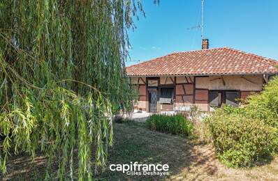 Beaupont (01270), maison bressane de plain-pied à colombages d’environ 94 m² habitables, sur un terrain d’environ 1 161 m², avec garage, atelier et greniers — photo du bien