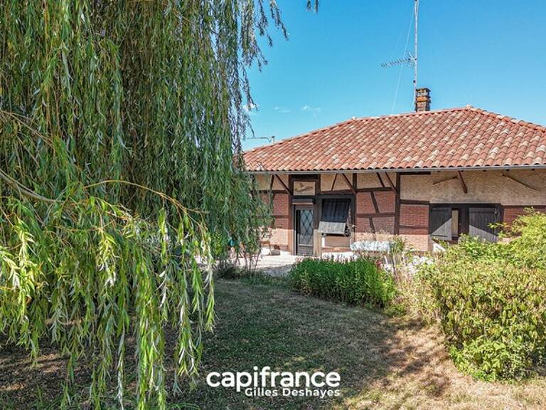 Beaupont (01270), maison bressane de plain-pied à colombages d’environ 94 m² habitables, sur un terrain d’environ 1 161 m², avec garage, atelier et greniers — photo 1