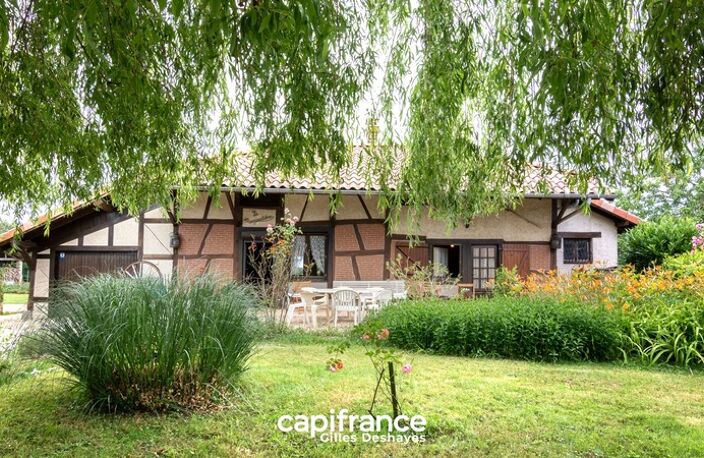 Beaupont (01270), maison bressane de plain-pied à colombages d’environ 94 m² habitables, sur un terrain d’environ 1 161 m², avec garage, atelier et greniers — photo 2
