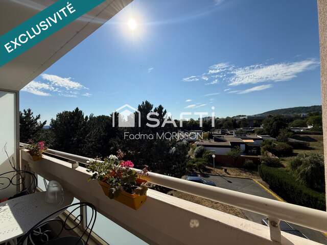 Appartement 65m² balcon, cave, et place de parking boxée — photo du bien