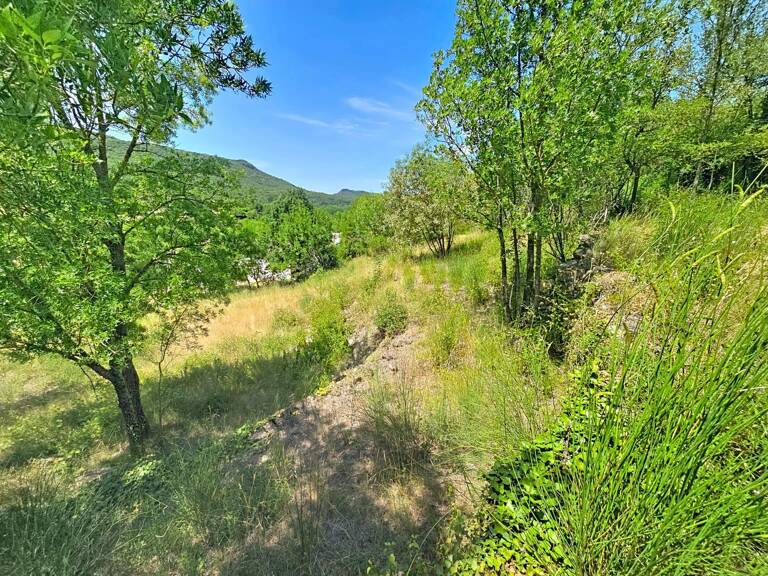 Construisez votre projet dans l'un des secteurs les plus recherchés d'Hérépian, avec une vue dominante et un environnement préservé. — photo 1