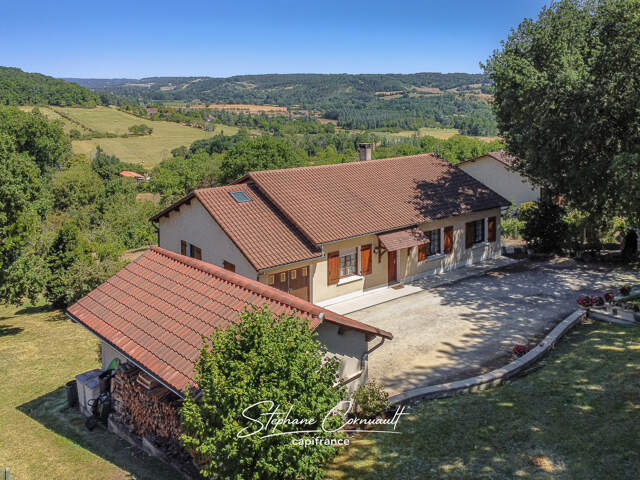 Maison de 115 m² avec grand terrain arboré — photo du bien