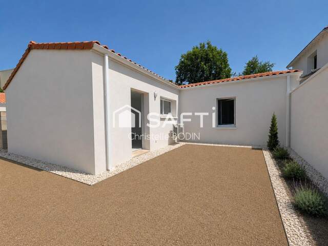 Maison neuve de plain-pied avec jardin  et stationnement Aytré disponible de suite. — photo du bien