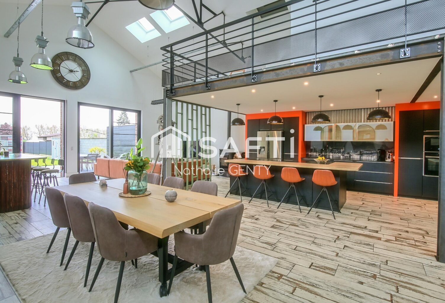 LOFT D'EXCEPTION AVEC JARDIN SUD ET DOUBLE GARAGE — photo 1