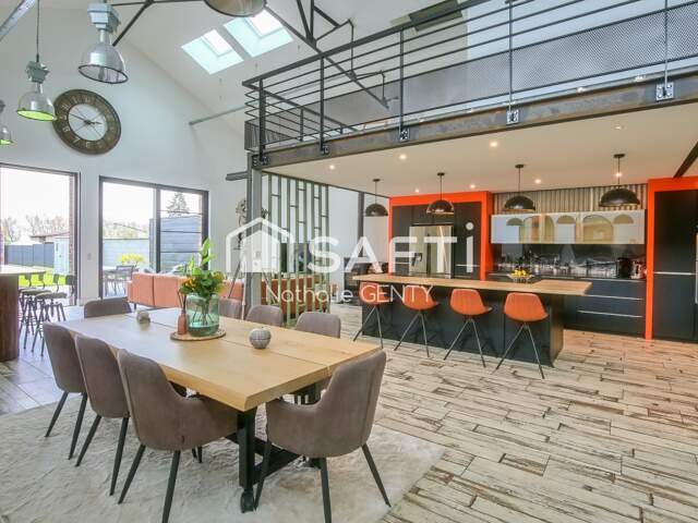 LOFT D'EXCEPTION AVEC JARDIN SUD ET DOUBLE GARAGE — photo du bien