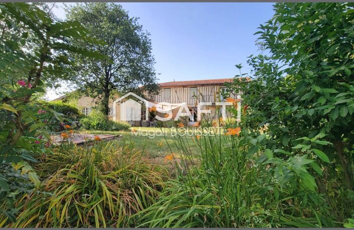 Ce bien à fort potentiel est situé dans un environnement verdoyant et paisible. Il dispose de terrasses, d'un puits, d'un atelier, d'abris couverts ainsi que d'un jardin arboré. — photo 2