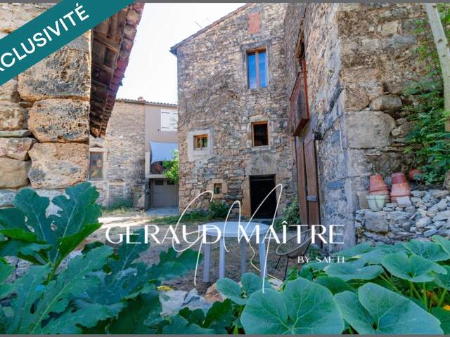 maison de village avec cour, garage et gros potentiel — photo du bien