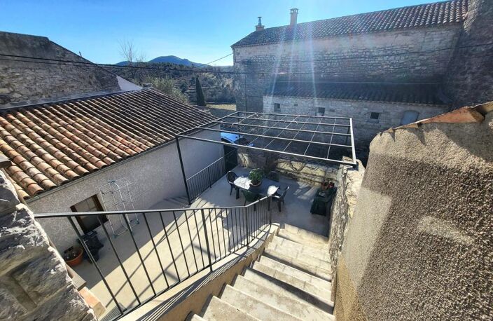 Maison de village en pierre avec terrasse et garage à Saint-André-de-Cruzières (07) — photo 2