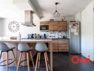 Appartement en rez-de-jardin avec un garage — photo 2
