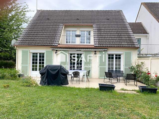 Maison rénovée avec goût dans un environnement paisible et verdoyant — photo du bien