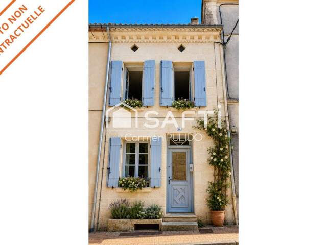 Charmante maison de village en pierre située en plein cœur du bourg de Rauzan. — photo du bien
