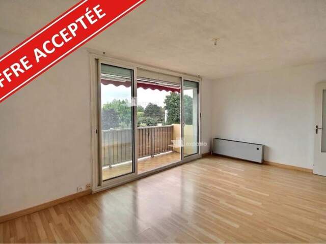 Appartement lumineux avec terrasse, garage et fort potentiel — photo du bien