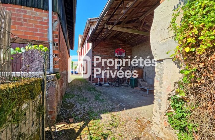Grande maison en pierre à rénover avec jardin, dépendances et fort potentiel — photo 5