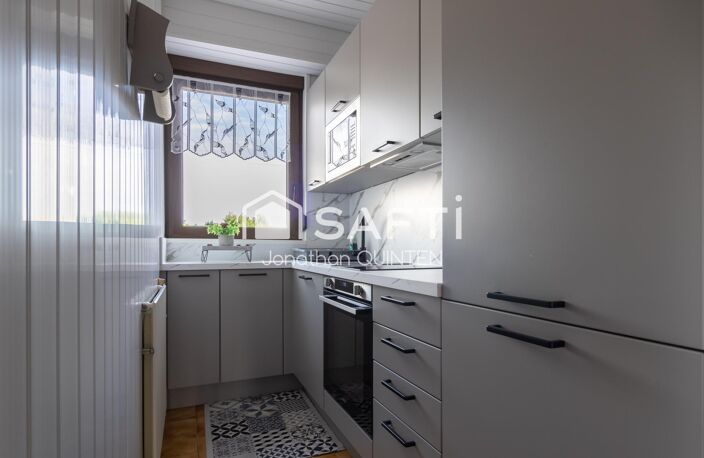 Vous recherchez une maison où chaque détail a été soigné au fil des années ? Cette propriété est faite pour vous. — photo 5