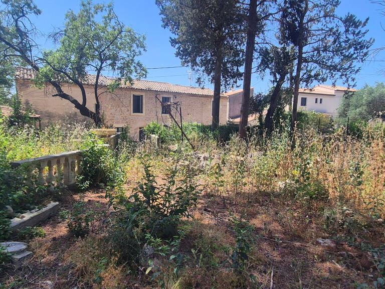 CASTRIES TERRAIN A BATIR DE 257M2 CENTRE VILLAGE — photo 1