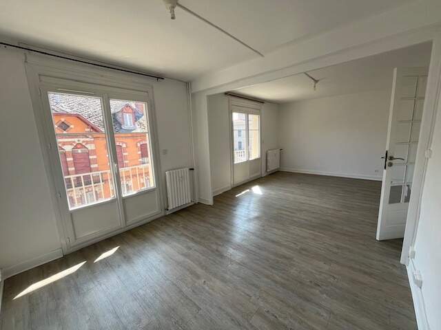APPARTEMENT DE TYPE 4 75 M² AVEC CAVE ET GARAGE PRIVATIF — photo du bien