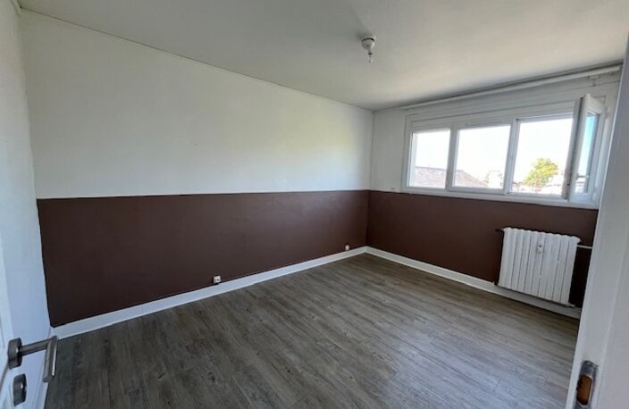APPARTEMENT DE TYPE 4 75 M² AVEC CAVE ET GARAGE PRIVATIF — photo 3