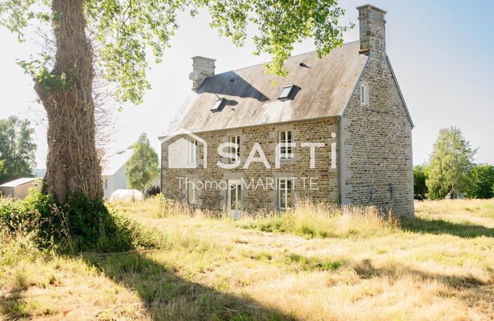 Coup de cœur pour les amateurs de charme et de grands projets ! Découvrez cette authentique maison de caractère de 178 m², sa superbe dépendance de 200 m² et son terrain de 11 360 m² dont une partie constructible. Un bien rare offrant un potentiel exceptionnel à seulement quelques minutes de Vire Normandie. — photo 2