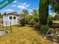 À Saintes, quartier Abbaye maison de 135 m² offrant deux espaces de vie distincts, un jardin, et véranda — photo 2