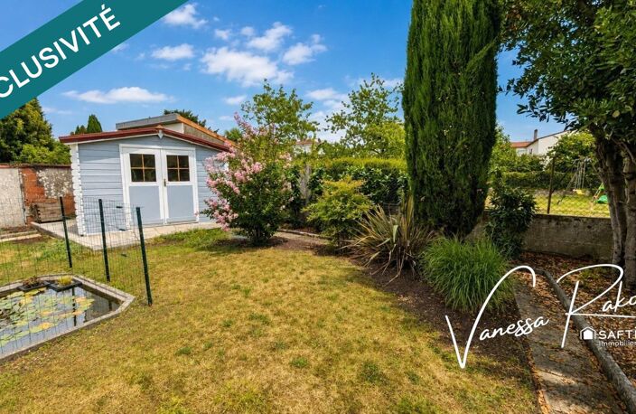 À Saintes, quartier Abbaye maison de 135 m² offrant deux espaces de vie distincts, un jardin, et véranda — photo 2