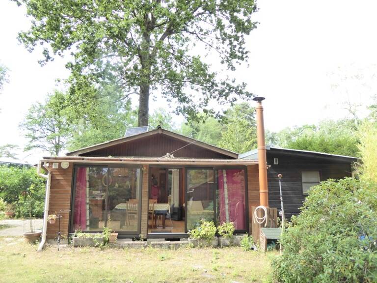 Chalet 2 pièces de plain pied avec véranda-salon 53m² — photo 1