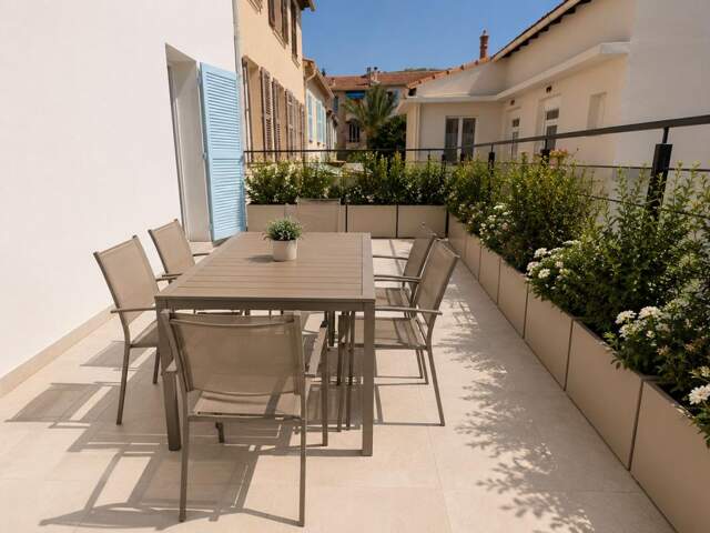 A vendre grand studio neuf de 22 m² avec terrasse de 20 m² et place de parking privative — photo du bien