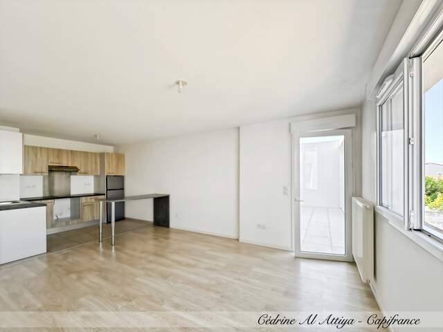 Appartement à vendre à Aytré, 52m2, 1 chambre, balcon, ascenseur et parking — photo du bien