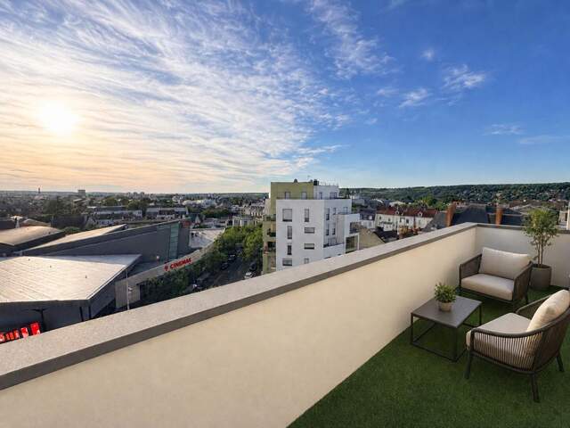 EXCLUSIVITÉ - Appartement d'exception au dernier étage avec terrasse panoramique de 30 m² - Mantes-la-Jolie Centre — photo du bien