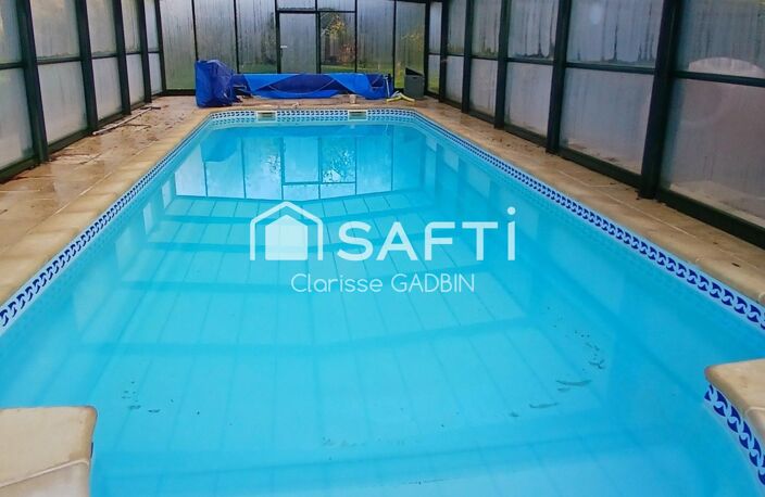 Magnifique propriété avec longère rénovée avec 3 chambres, piscine couverte, 16 hectares de terrain dont bois — photo 4