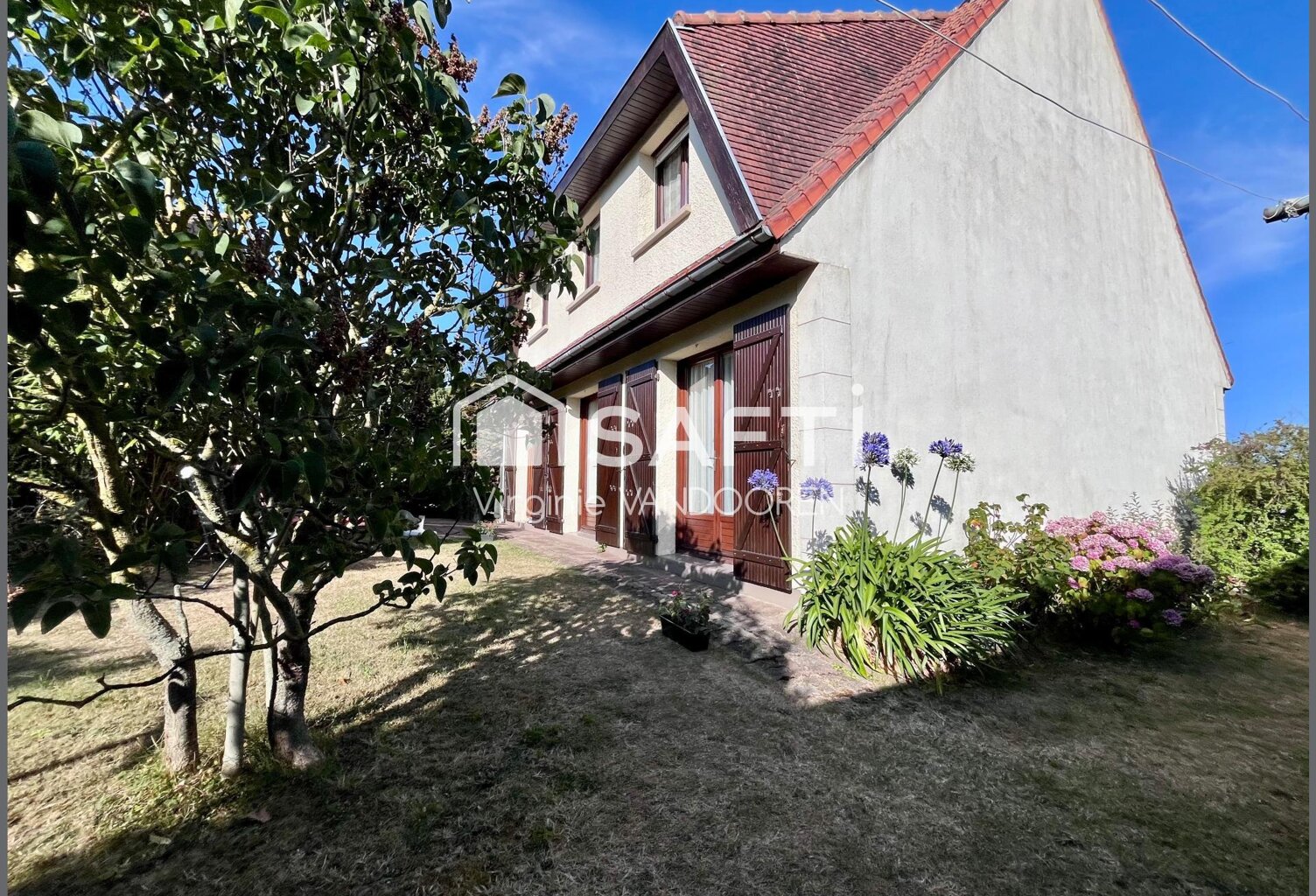 Maison individuelle 4 chambres, jardin arboré et grand sous-sol — photo 1