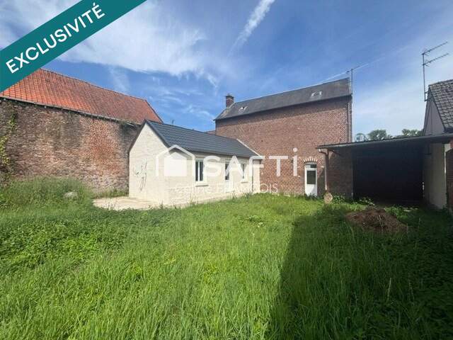 Maison en briques de 115 m² avec jardin, garage — photo du bien