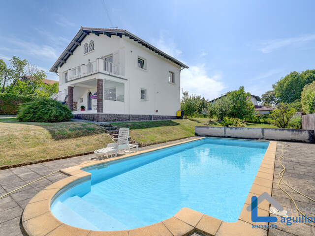 MAISON DE 170M2 COMPRENANT DEUX APPARTEMENTS T3 — photo du bien
