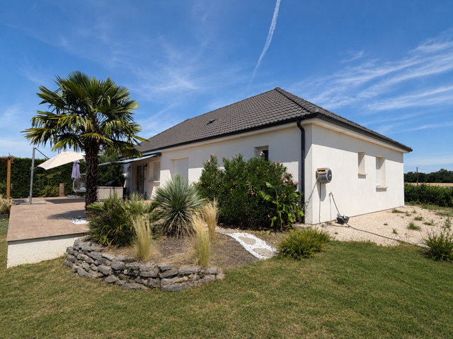 Maison contemporaine de plain-pied   112 m2 habitables   4 c — photo du bien