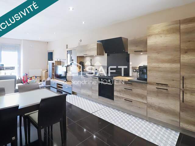 Maison rénovée de 110m2 hab avec 3 chambres, terrasse, jardin et garage — photo du bien