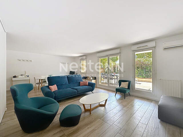 Appartement rez de jardin 4 pièces 3 chambres avec 2 terrasses et une cave - 69008 LYON — photo du bien
