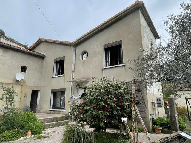 Maison T5 avec garage et jardin — photo du bien