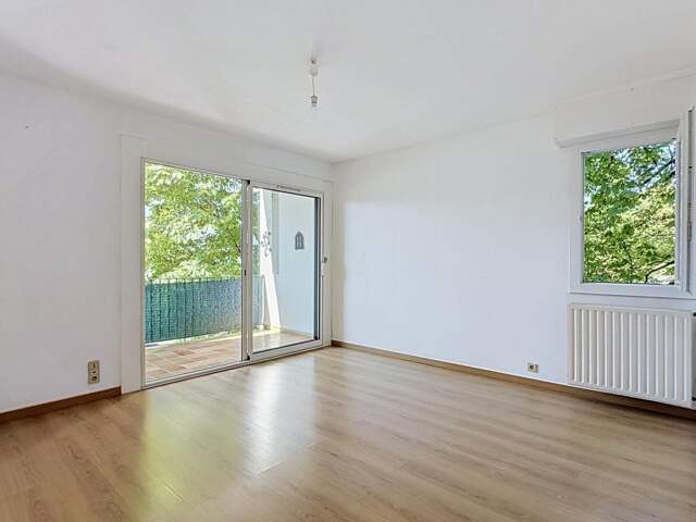 appartement type 3 avec cave parking et garage — photo du bien