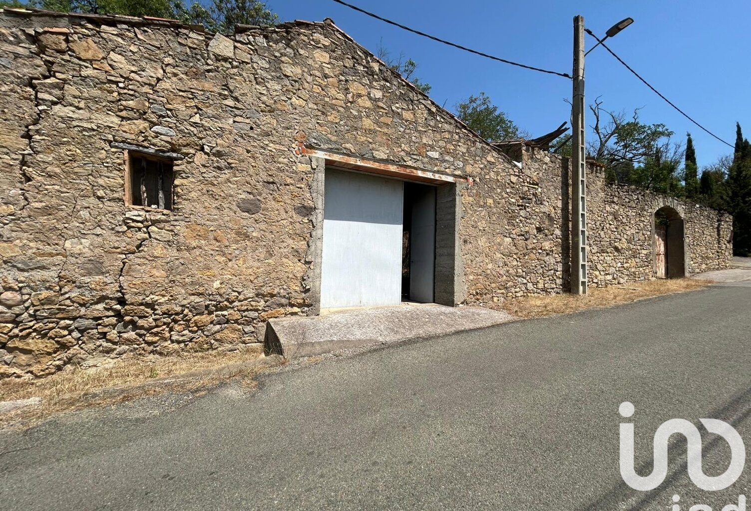 Vente Garage 107 m&sup2; — photo 1