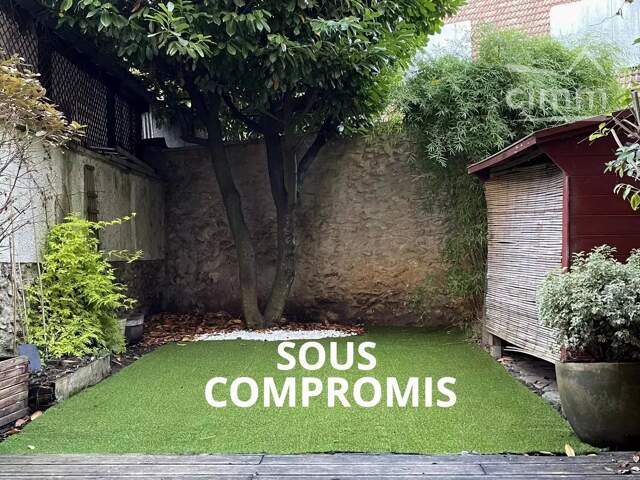 Charme et calme pour ce T2 avec jardin privatif au coeur du quar — photo du bien