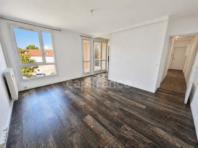 Appartement F3 avec loggia et parking - proche commerces et gare — photo du bien