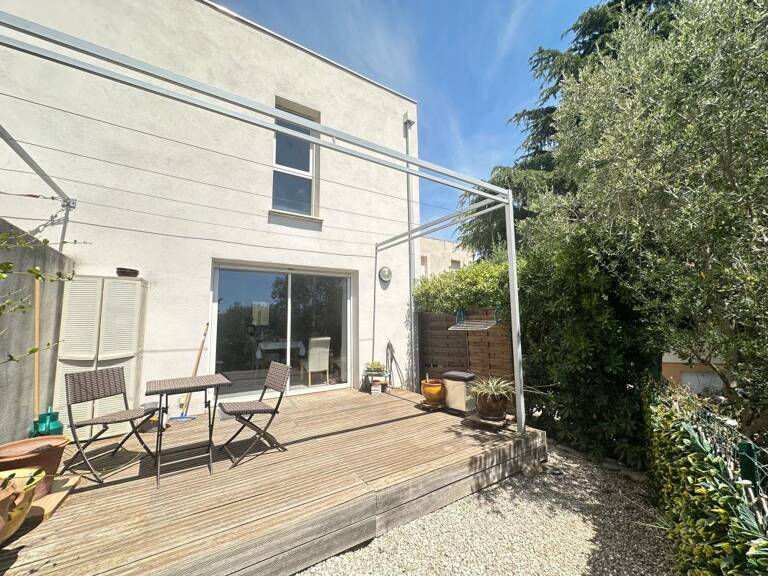 Maison À Vendre de 66 m² avec terrasse de 13 m² garage et place de stationnement — photo 1