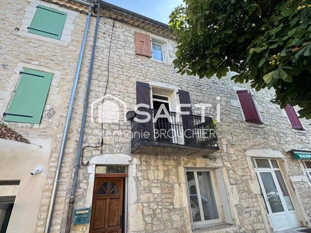Maison de village avec garage et jardin — photo du bien