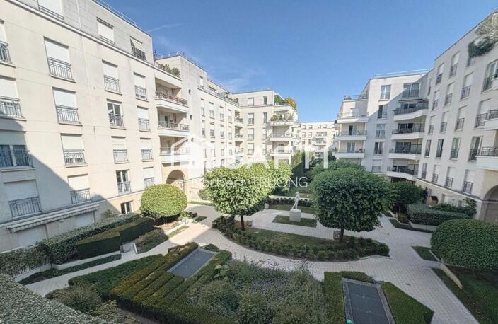 73M2 - SEJOUR - CUISINE - 2 CHAMBRES - SDB - LOGGIA - BALCON - CAVE - PARKING — photo 3