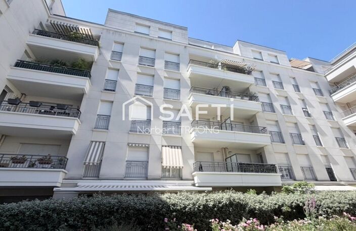 73M2 - SEJOUR - CUISINE - 2 CHAMBRES - SDB - LOGGIA - BALCON - CAVE - PARKING — photo 4