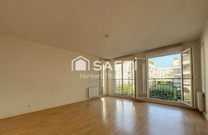 73M2 - SEJOUR - CUISINE - 2 CHAMBRES - SDB - LOGGIA - BALCON - CAVE - PARKING — photo 5